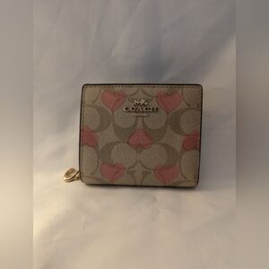 Coach folding wallet.